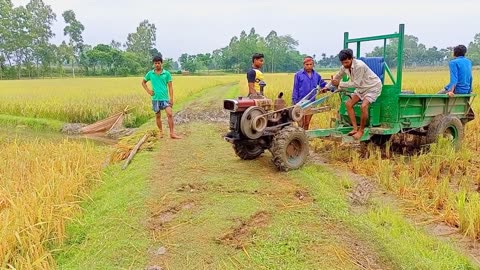 Watch footage of Power Tiller Driver | How Power Tiller drives on mud roads