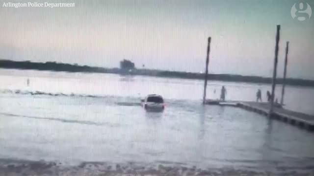 Dashcam footage shows drunk driver plunge car into lake to evade police