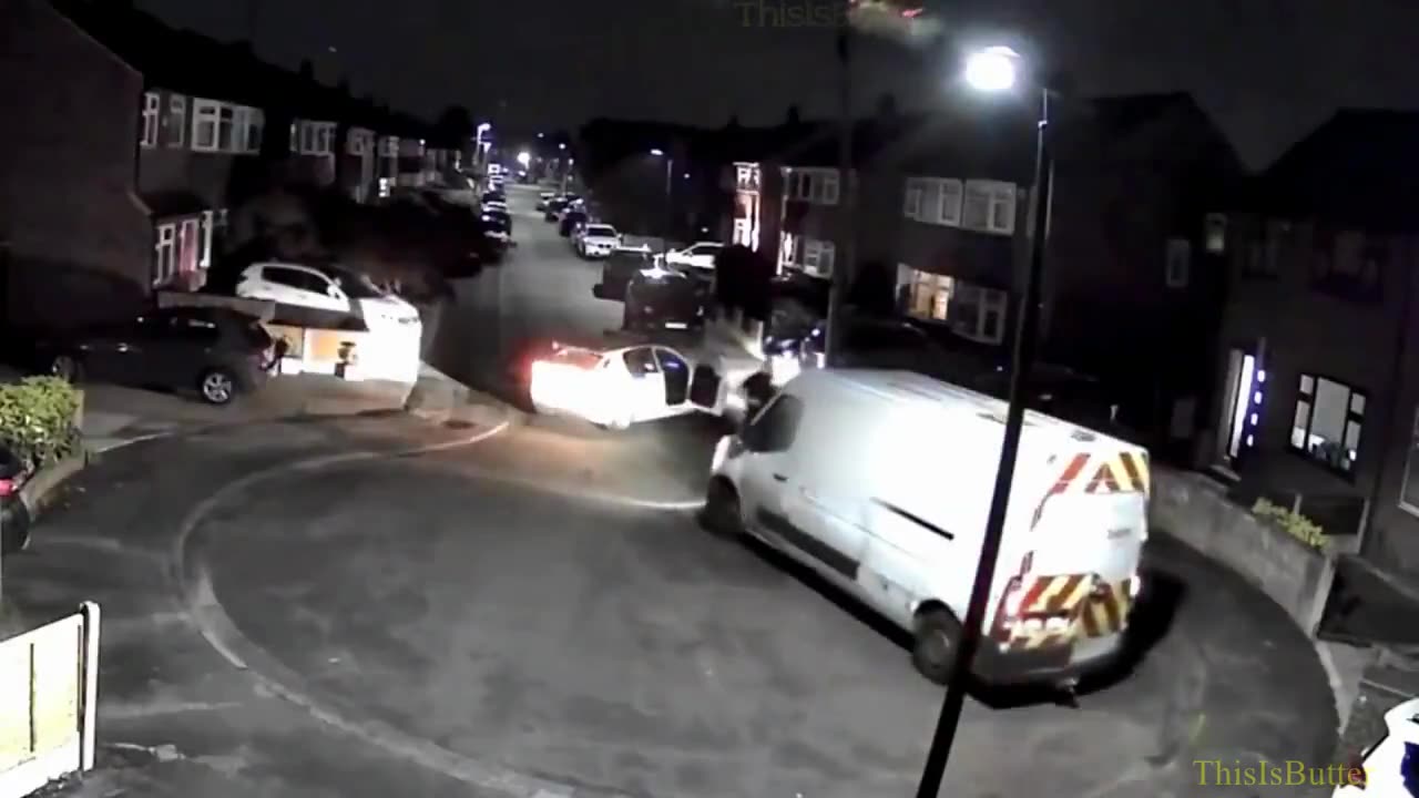 Surveillance and bodycam shows suspect ramming van at an officer