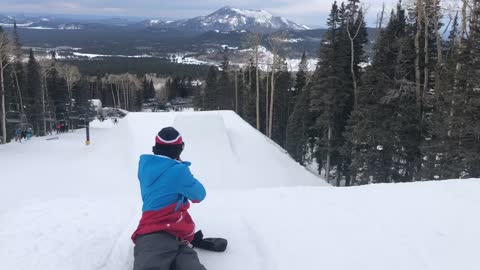 Kid sends biggest jump on skis, hits lip and falls