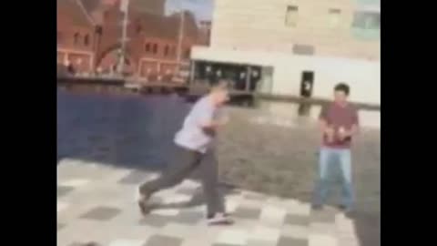 Man Epically Fails To Jump Across River