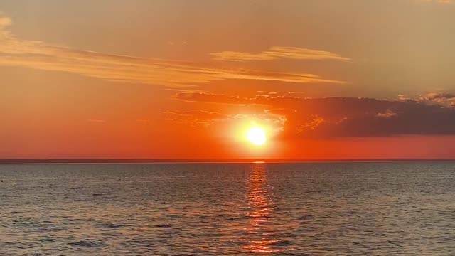 The View Of The Sunset In The Horizon