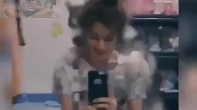 The hostess and the dog shoot a video together