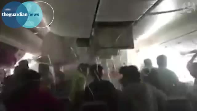 Dubai plane crash_ chaotic scenes inside plane after crash-landing at Dubai airp