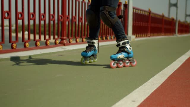 Supergirl sliding with roller skates