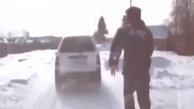 Cop Stops Drink-Driver By Jumping Into Moving Car