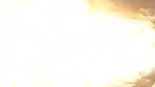 Idiot steps on flaming gas can