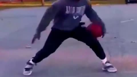 playing basketball at dusk