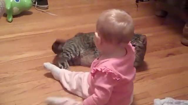 Baby laughing at dog & bubbles