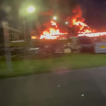 A Bill Gates Foundation Supermarket in the Netherlands Goes Up in Flames