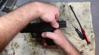 How to clean a semi auto pistol and basic function .