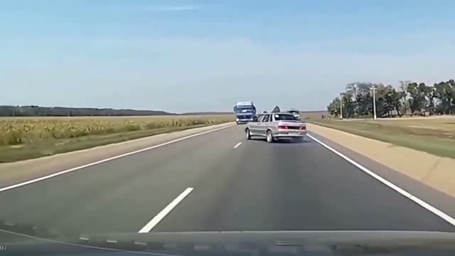Terrifying Dash Cam Footage - car loses control and has head on collision with truck