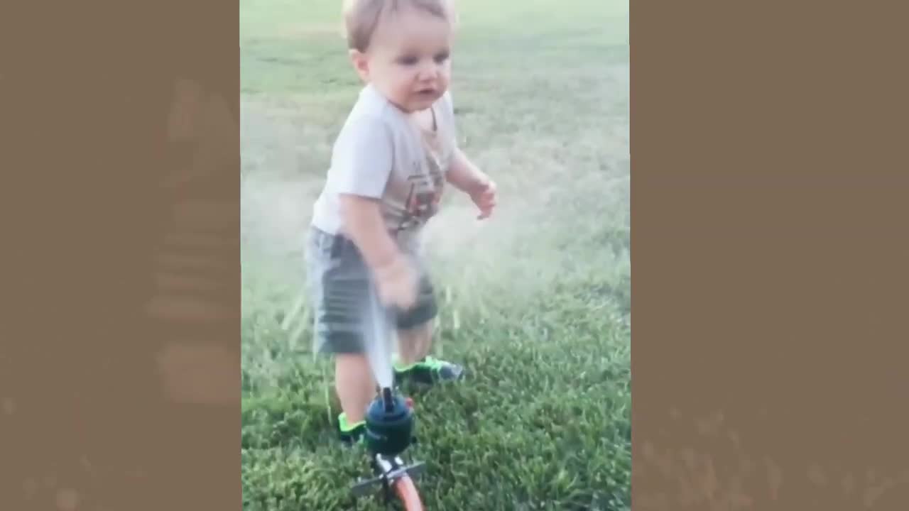 Baby playing with water.This is an amazing video.