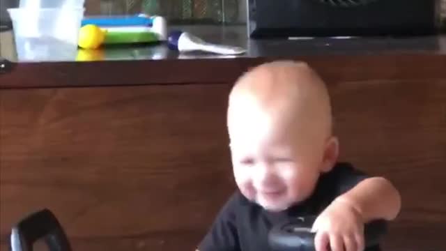 Baby Hilariously Headbangs To Kid Rock's 'Bawitdaba'