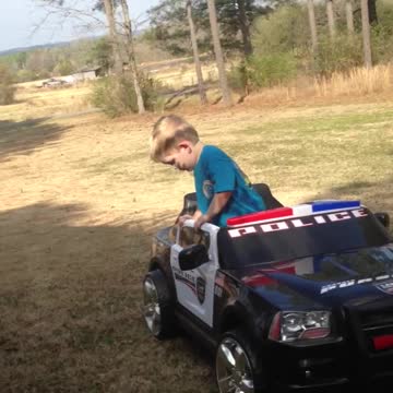 Little Boy Pretends To Take Sobriety Test To Drive Power Wheels Car