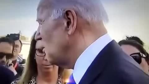 Maschera rappresenta Biden