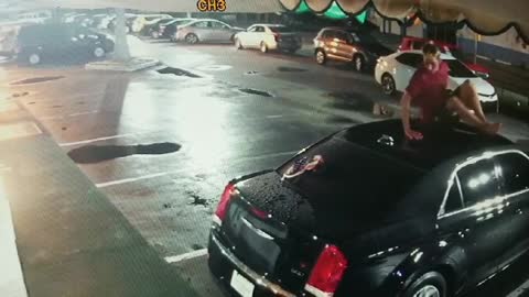 Floridian Caught Falling on Car