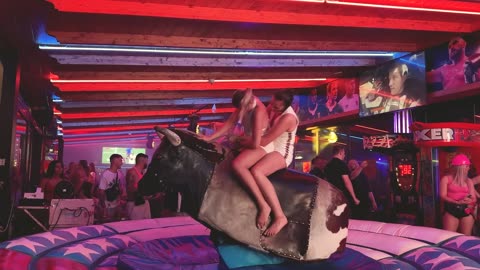 GIRL TAKE ON THE BULL! Benidorm Bull Ride. Mechanical Bull EPIC FAIL