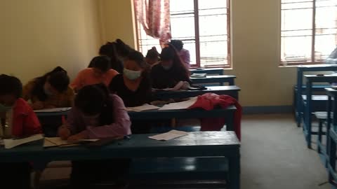 Students giving examination