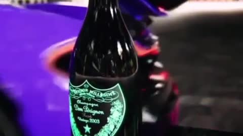 Super car pops the cork of a bottle