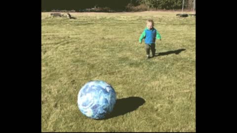 Gif video of boy playing with the ball