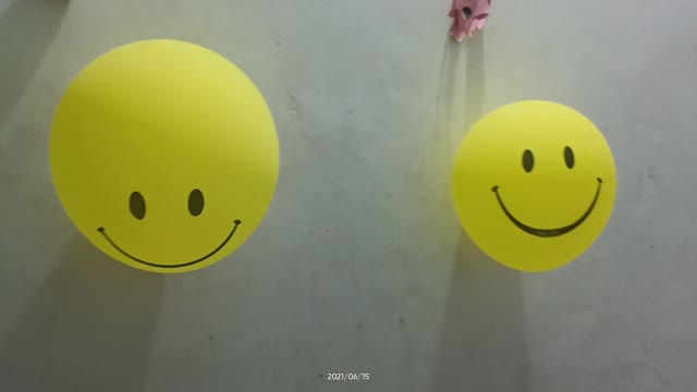 Two smiley..face smiling