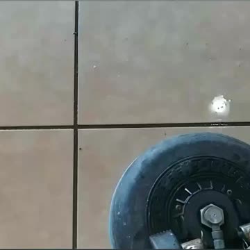 Adam demonstrates tile and grout cleaning