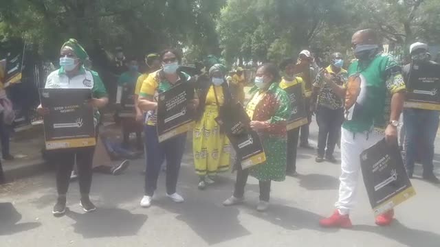 Members of the African National Congress (ANC) picket outside the eNCA studios in Hyde Par