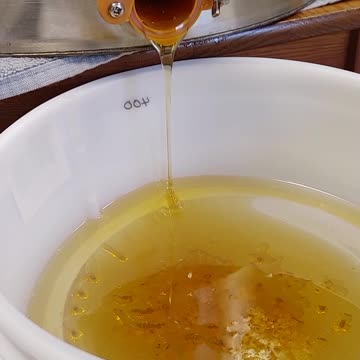 Honey Pouring from Honey Extractor