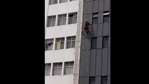 Man hangs out window of from Durban hotel