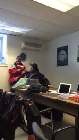 Coworker Scares Sleeping Cohort With Bullhorn