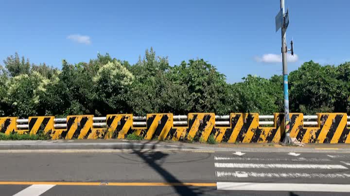 peaceful road, car passing on a sunny day