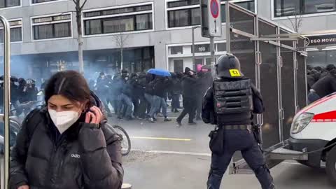 Zurich, Switzerland: Police attempt to disperse Antifa counter-protest using tear gas.