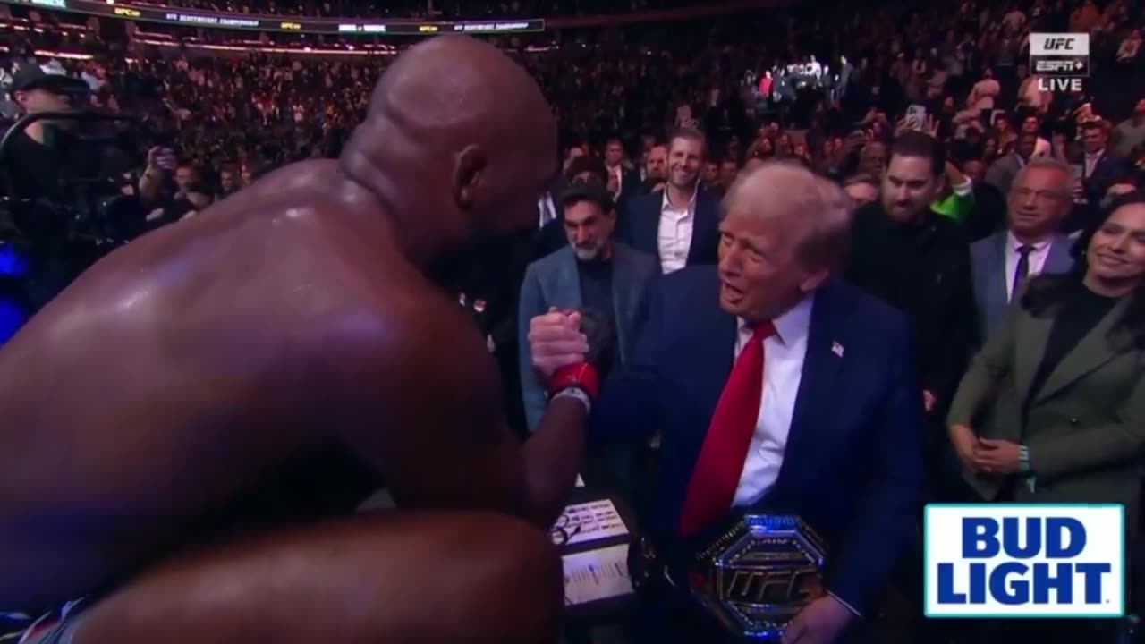 UFC Heavyweight Champion Jon Jones Does the Dance, Then Hands Trump His Belt