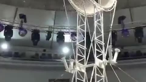Circus boy climbing