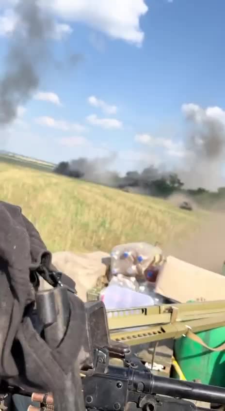 Ukrainian armour forces fleeing during heavy Russian artillery fire.
