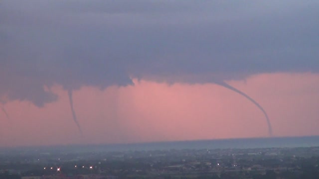 Seeing three waterspouts on the sea in the distance, it's so spectacular