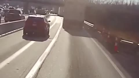 Distracted Truck Driver Nearly Topples Trailer