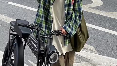 little boy riding a bicycle