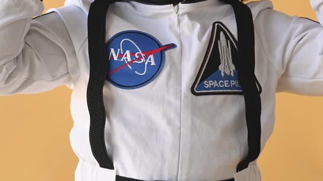 a-girl-wearing-nasa-spacesuit-costume