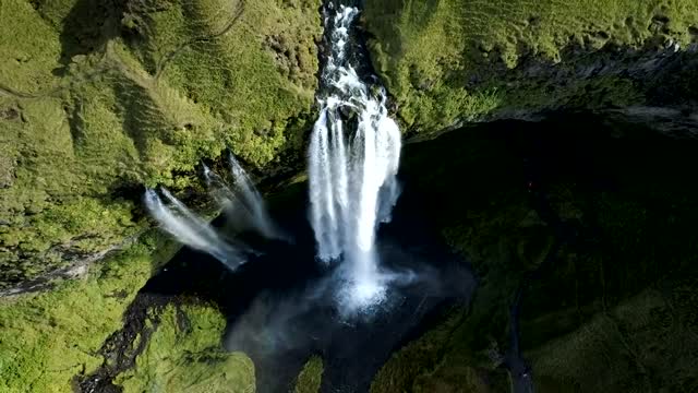 Delightful water falling mountain woodland