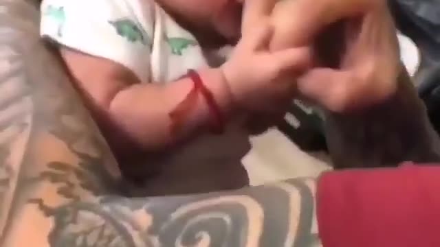 Cute baby angry on dad