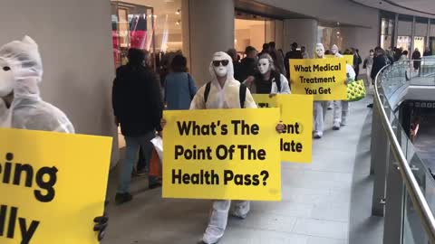 An anti-covid performance at a shopping mall in Edinburgh, Scotland.