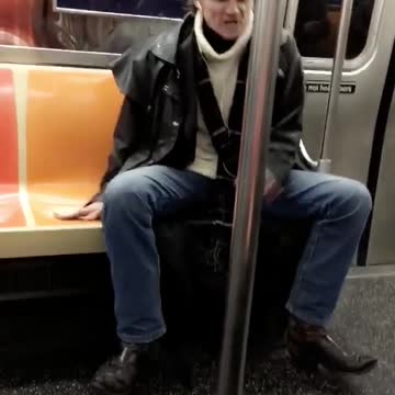 Guy slapping subway seat screaming making colorful friends