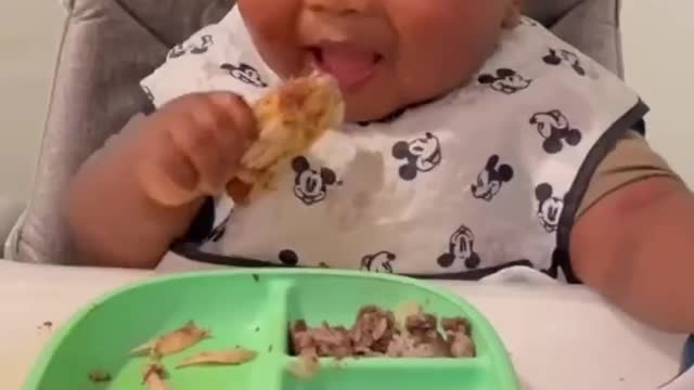 The baby is really cute when eating. I like it very much