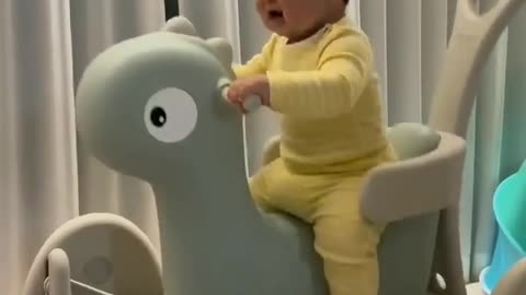 Baby playing with funny toy