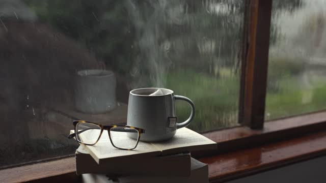 A cup of coffee with the atmosphere of rain and calm calm