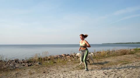 Out for a run with her pet dog