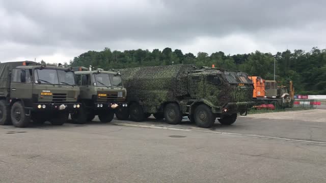 Czech Army Trucks Practice Driving Around Slippery Roads