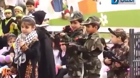 These Palestinian children role play murdering Israelis and becoming “martyrs.”
